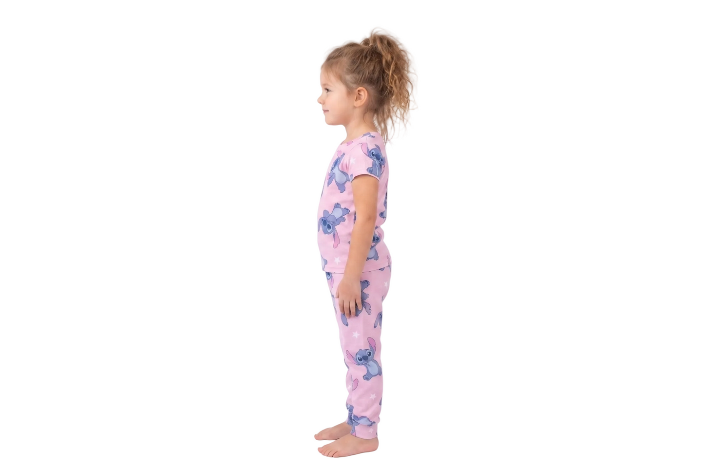Disney Lilo & Stitch Girls 2-Piece Pajama Set, Short Sleeve All-Over Print Stitch and Stars Graphic Tee and Matching Pants, Pink