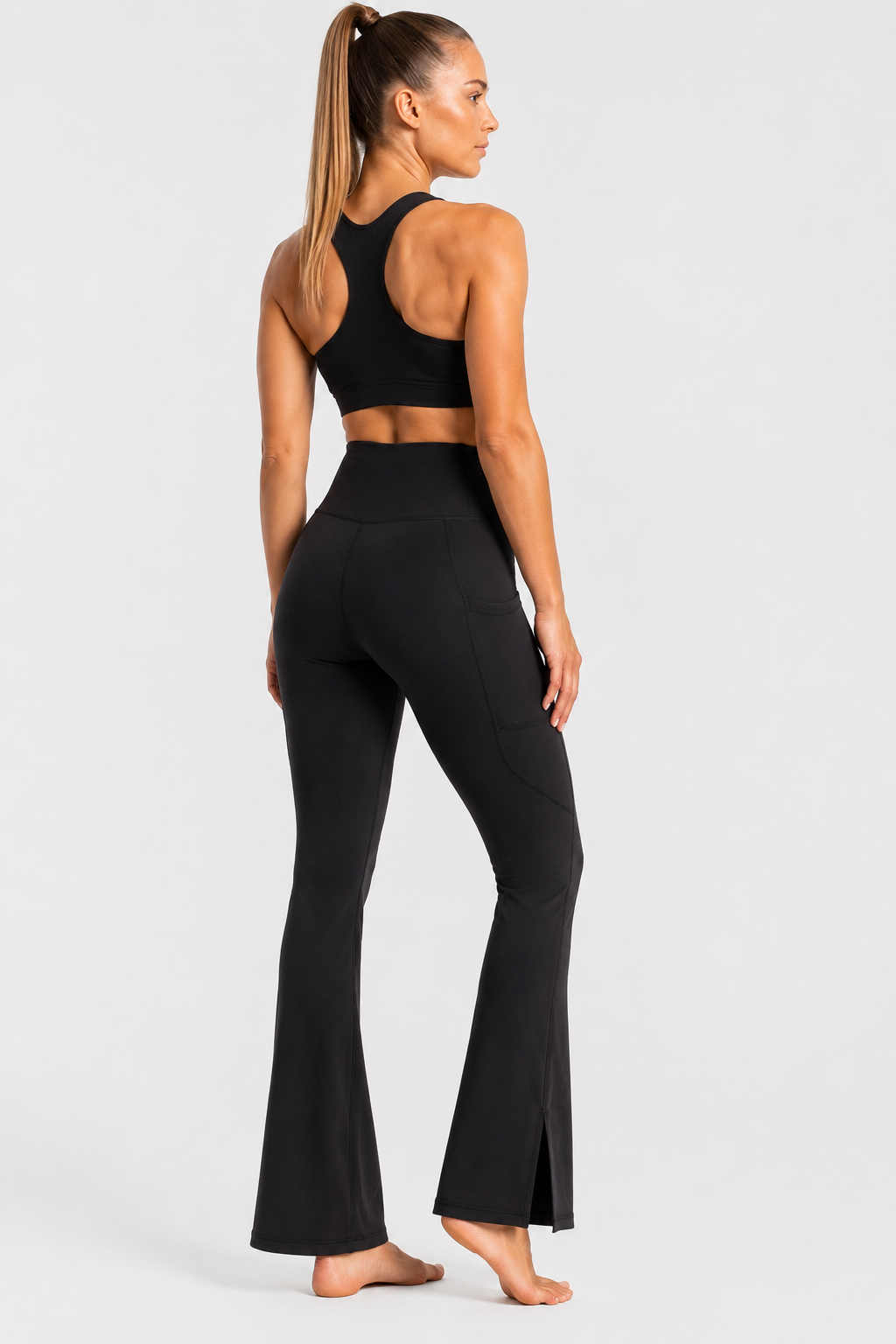 New York Laundry Women's High-Waisted Flare Yoga Pants with Side Pockets and Hem Slits, Jet Black