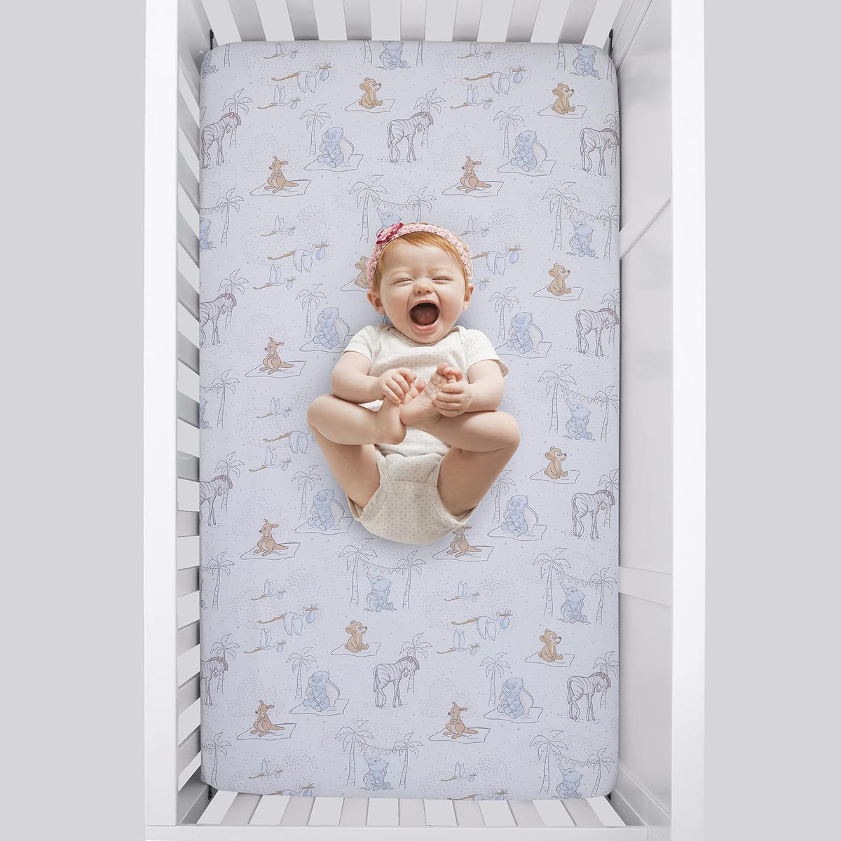 Disney Baby Dumbo Storybook Nursery 6-Piece Crib Bedding Set, Comforter, Fitted Sheets, Blanket, Changing Pad Cover & Wall Decal/Banner, Blue and White