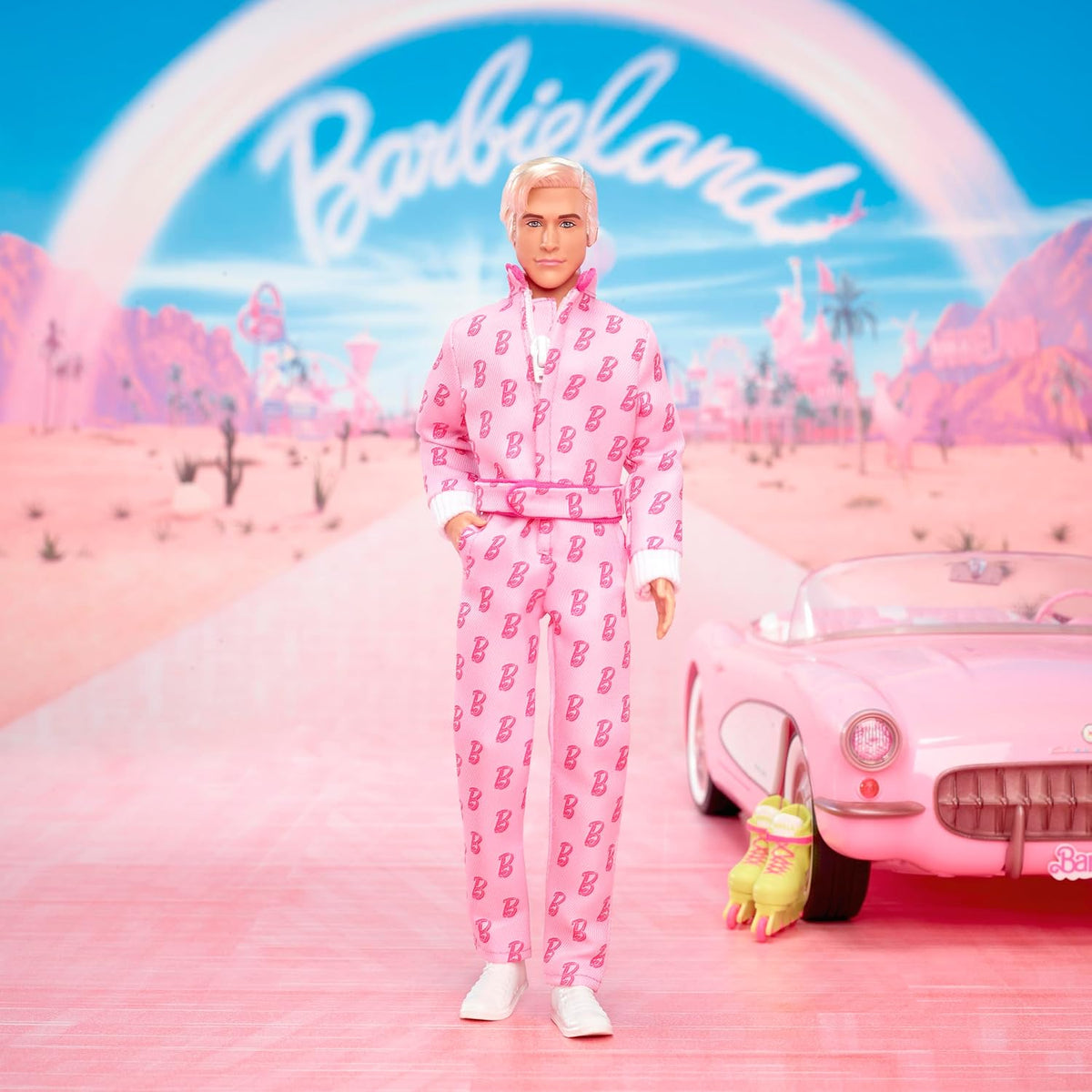 Barbie The Movie Ken Collectible Doll, Ryan Gosling as Ken in Pink Jumpsuit with “B” Detail, White Sneakers & Multicolor Roller Skates