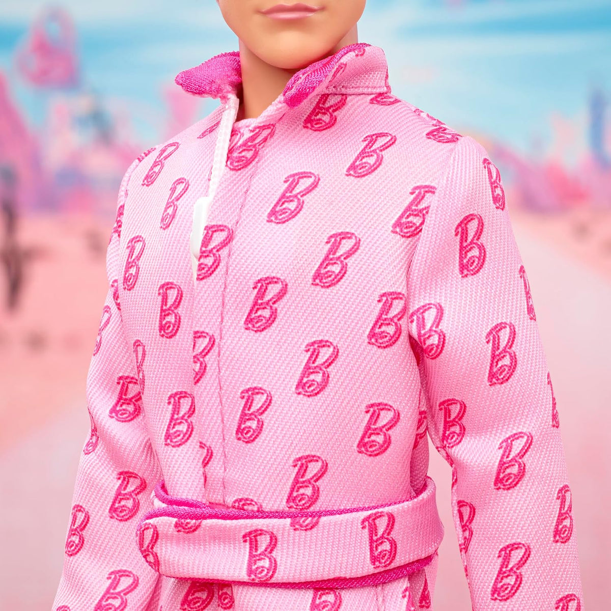 Barbie The Movie Ken Collectible Doll, Ryan Gosling as Ken in Pink Jumpsuit with “B” Detail, White Sneakers & Multicolor Roller Skates