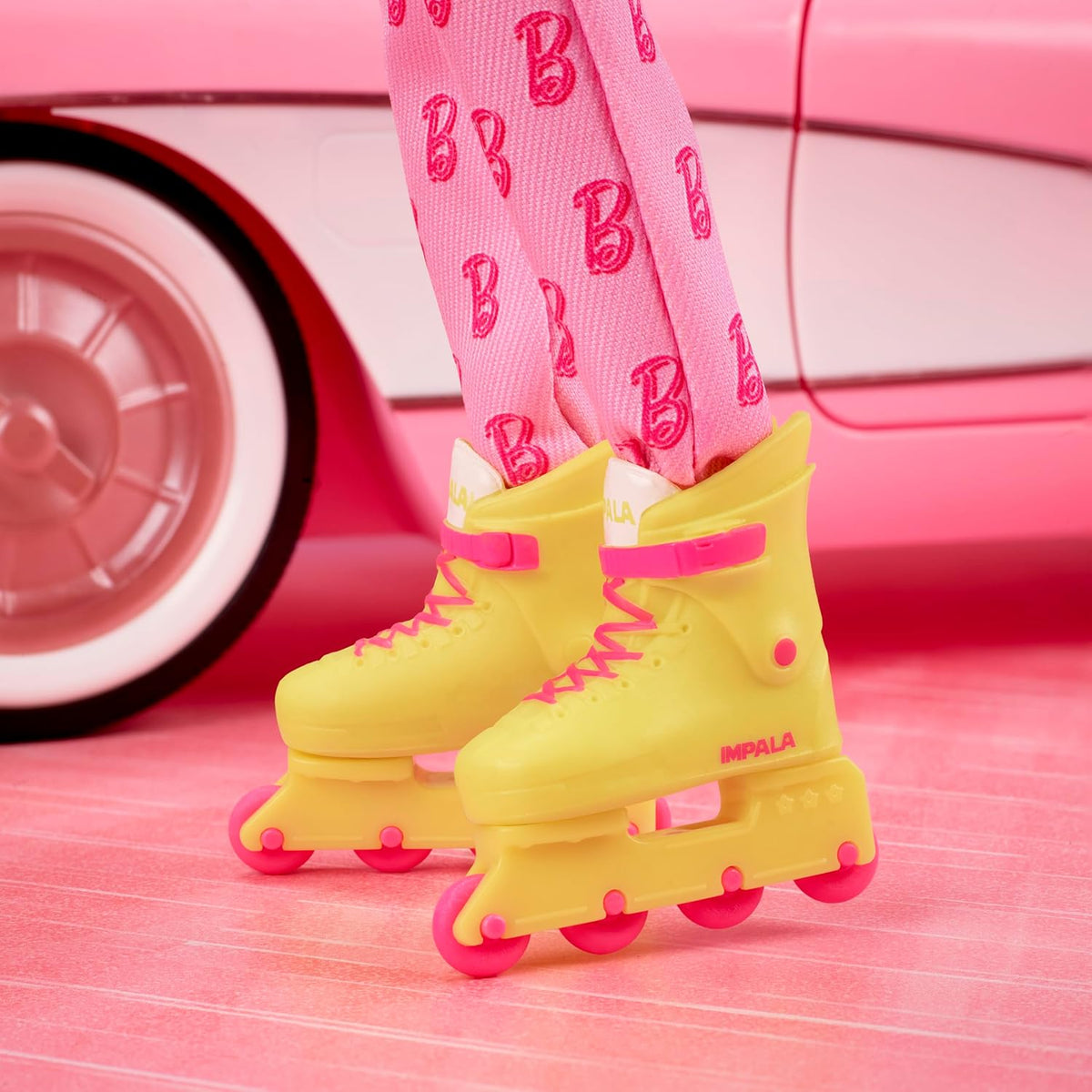 Barbie The Movie Ken Collectible Doll, Ryan Gosling as Ken in Pink Jumpsuit with “B” Detail, White Sneakers & Multicolor Roller Skates